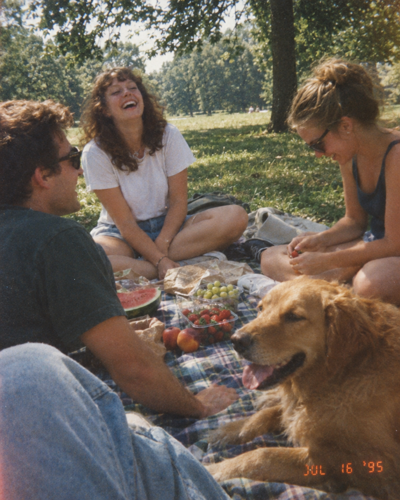 A picnic with friends and a dog